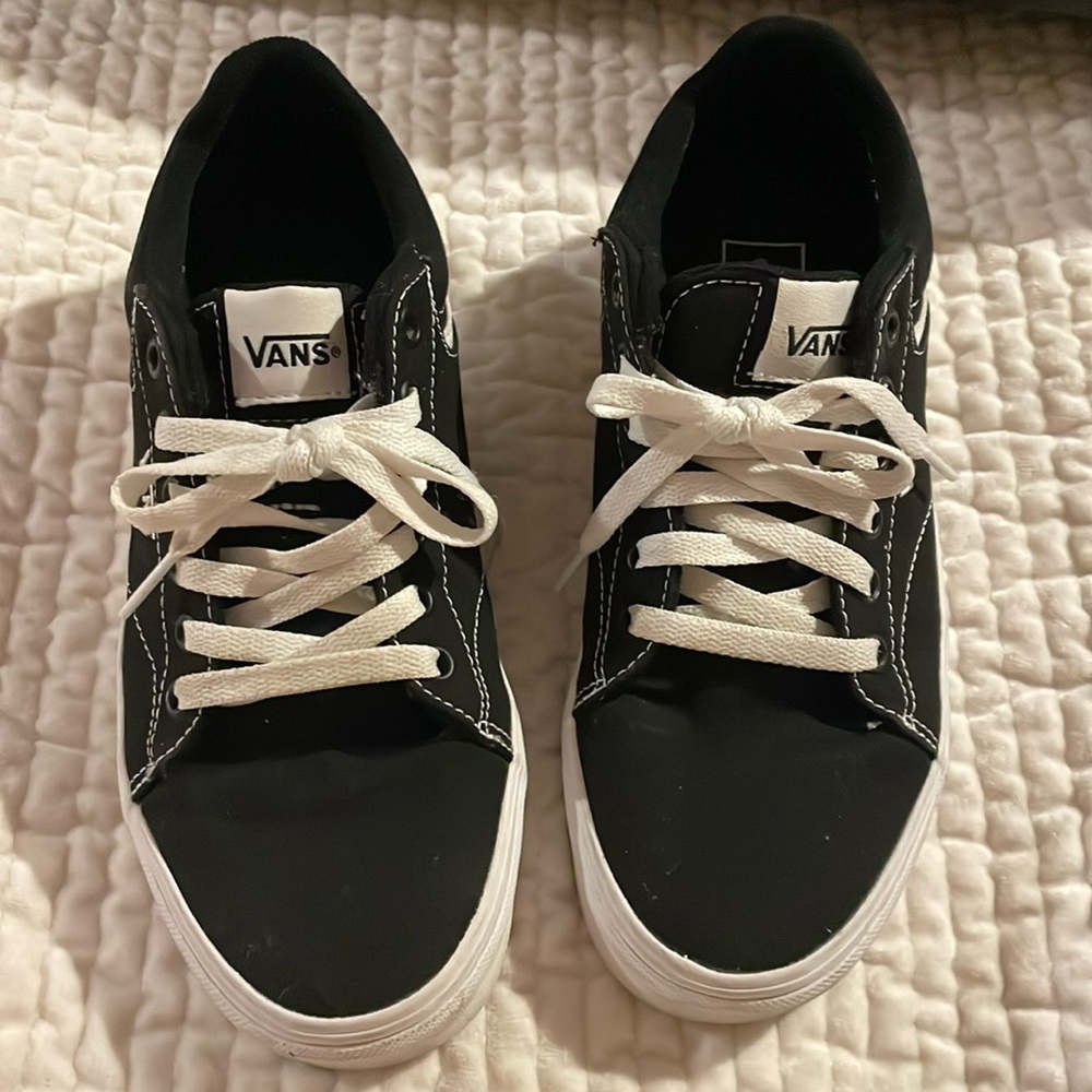 Woman’s black lightly worn Van sneakers